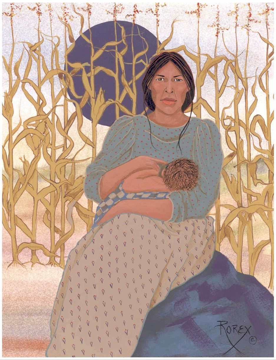 WOMAN NURSING BABY IN CORNFIELD