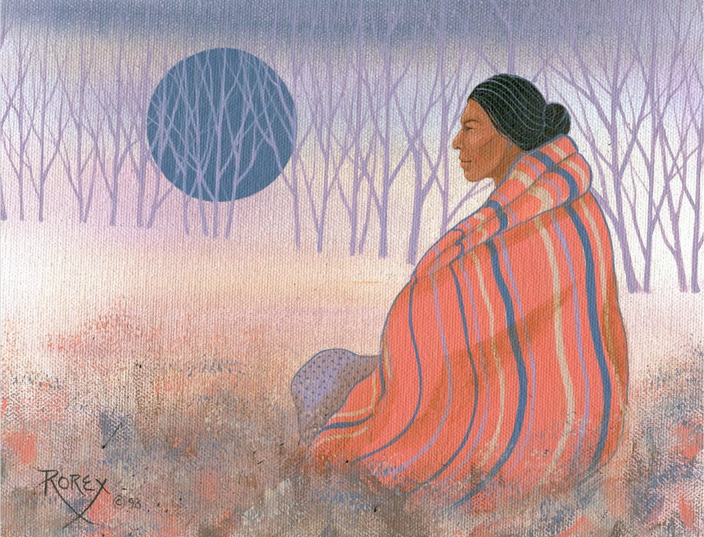 Native woman wrapped in striped pink blanket